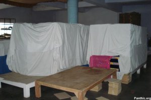 Hundereds of Saroops of Guru Granth Sahib Ji stacked like bricks, dozens of such stacks were in the complex.