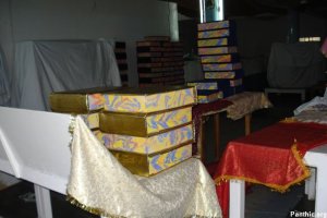 Hundereds of Saroops of Guru Granth Sahib Ji stacked like bricks, dozens of such stacks were in the complex.