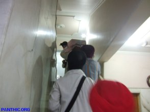 Singhs bringing Guru Granth Sahib Saroops from Mandar