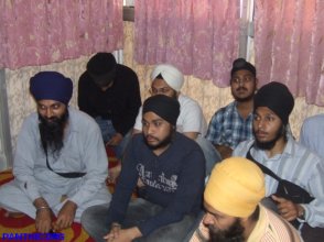 Singhs bringing Guru Granth Sahib Saroops from Mandar