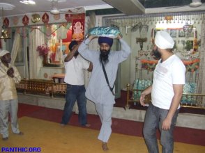 Dera Daata Darbar, Delhi - Palkis for Geeta and Ramayan next to Guru Granth Sahib Saroop