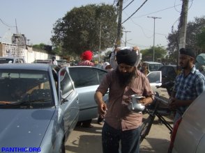 Singhs bringing Guru Granth Sahib Saroops from Mandar