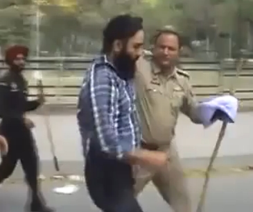Mohali SHO Kul Bhushan Forcibly Removing a Young Sikh's Dastar