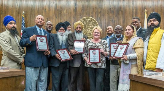City of Harvey officials with representatives of Sikh organizations