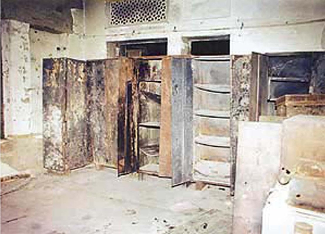The Army claimed that it entered the Golden Temple complex with “sadness and reverence” (Tribune, June 7, 1984). In contrast, according to the head librarian, Army troops burned the Sikh Reference Library housing rare Sikh manuscripts and historical artifacts, after they had taken control of the building. Part of the burned library is pictured at right. Photo courtesy of the Tribune.